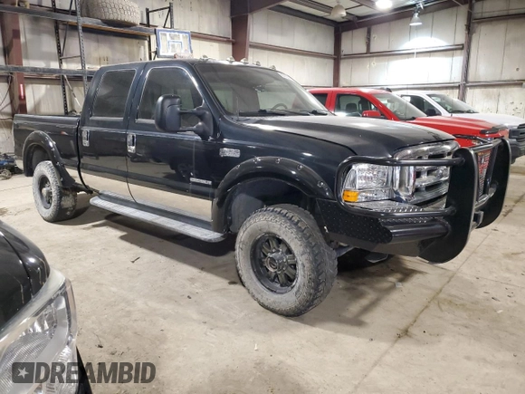 2001 Ford F-350 with VIN 1A040185, listed as a Copart auction lot 87953295 with 212,487 mi miles and Salvage title. Bid and sale history available at DreamBid. Image 4.