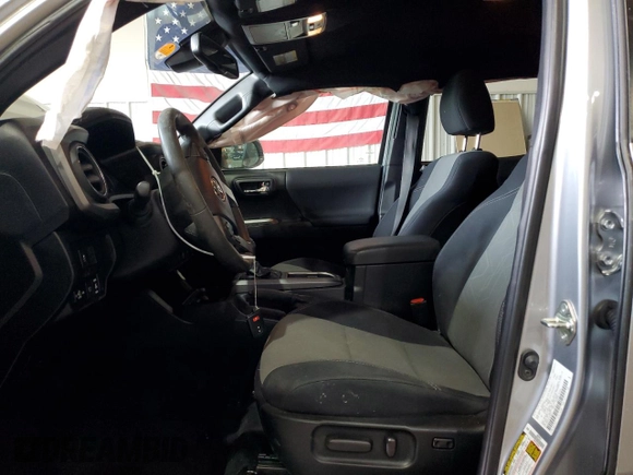 2020 Toyota Tacoma SR5 z VIN 5TFCZ5AN7LX222217, wystawiony jako Copart lot #45892765 z przebiegiem 79 098 mil mil oraz Szkoda całkowita • Salvage title. Historia ofert i sprzedaży dostępna na DreamBid. Obrazek 7.