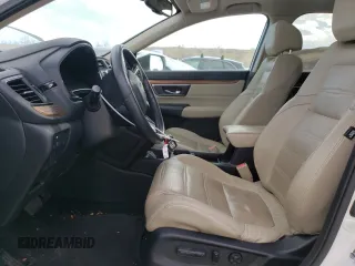 2018 Honda CR-V Touring with VIN 5J6RW2H95JL030237, listed as a Copart auction lot 44001415 with 55,575 mi miles and Salvage Title. Bid and sale history available at DreamBid. Image 7.