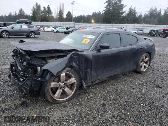 2006 Dodge Charger SRT-8 with VIN 2B3LA73W76H512508, listed as a Copart auction lot 86312114 with 177,592 mi miles and Salvage Title. Bid and sale history available at DreamBid. Image 1.
