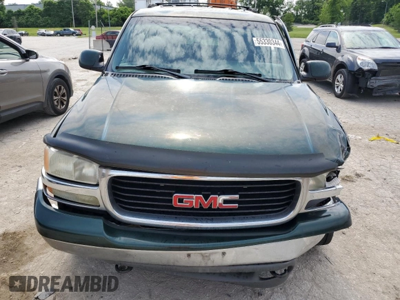 2002 GMC Yukon SLE z VIN 1GKEC13Z22R152796, wystawiony jako Copart lot #55330344 z przebiegiem 337 318 mil mil oraz Szkoda całkowita • Salvage title. Historia ofert i sprzedaży dostępna na DreamBid. Obrazek 5.