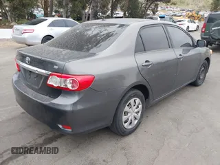 2011 Toyota Corolla L with VIN JTDBU4EE7BJ106810, listed as a IAAI auction lot 42054750 with 256,064 mi miles. Bid and sale history available at carsss.com. Image 4.