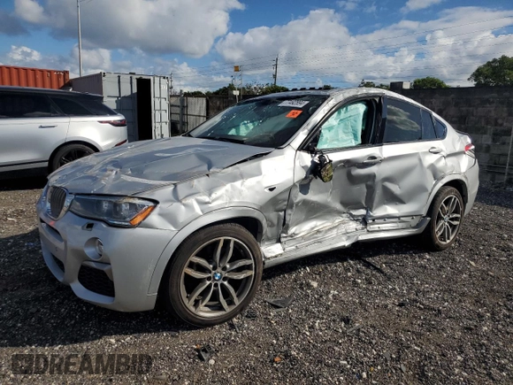 2017 BMW X4 M40i with VIN 5UXXW7C51H0U25511, listed as a Copart auction lot 77492894 with 94,003 mi miles and Salvage Title. Bid and sale history available at carsss.com. Image 1.