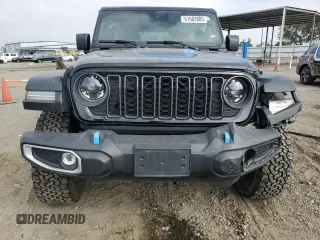2024 Jeep Wrangler Rubicon z VIN 1C4RJXR6XRW291900, wystawiony jako Copart lot #61682885 z przebiegiem Nie podano mil oraz Szkoda całkowita • Salvage title. Historia ofert i sprzedaży dostępna na DreamBid. Obrazek 5.