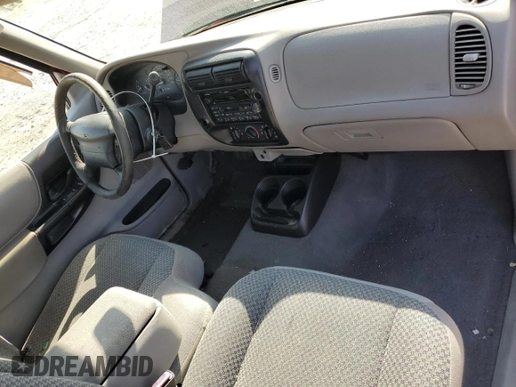 1999 Ford Ranger XL with VIN 1FTYR14V2XPA97269, listed as a Copart auction lot 52741825 with 142,302 mi miles and Salvage title. Bid and sale history available at DreamBid. Image 8.