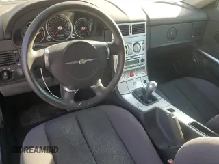 2006 Chrysler Crossfire z VIN 1C3AN59L86X062301, wystawiony jako Copart lot #57523395 z przebiegiem 277 586 mil mil oraz Tytuł czysty. Historia ofert i sprzedaży dostępna na DreamBid. Obrazek 8.