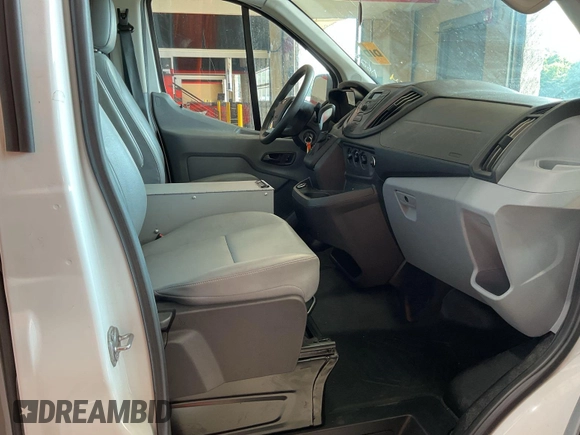 2019 Ford Transit with VIN 1FTYE1YM6KKB31880, listed as a IAAI auction lot 42792031 with 99,943 mi miles and . Bid and sale history available at DreamBid. Image 9.
