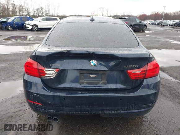 2016 BMW 4 Series 428i xDrive with VIN WBA4C9C59GG137067, listed as a IAAI auction lot 41913733 with 104,378 mi miles and . Bid and sale history available at carsss.com. Image 16.