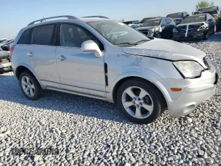 2014 Chevrolet Captiva Sport LT with VIN 3GNAL3EK0ES626470, listed as a Copart auction lot 47644385 with 95,141 mi miles and Salvage Title. Bid and sale history available at DreamBid. Image 4.
