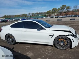 2019 BMW M4 with VIN WBS4Y9C5XKAG67446, listed as a IAAI auction lot 41669865 with 103,230 mi miles. Bid and sale history available at carsss.com. Image 13.