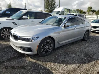 2018 BMW 5 Series 530e with VIN WBAJA9C52JG623073, listed as a Copart auction lot 82718984 with 79,543 mi miles and Clean title. Bid and sale history available at DreamBid. Image 1.