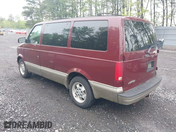 2003 Chevrolet Astro with VIN 1GNDM19X03B111420, listed as a IAAI auction lot 42210673 with 143,029 mi miles. Bid and sale history available at carsss.com. Image 3.