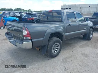 2011 Toyota Tacoma with VIN 5TFJX4GN7BX004212, listed as a IAAI auction lot 42590852 with 153,403 mi miles and . Bid and sale history available at DreamBid. Image 4.