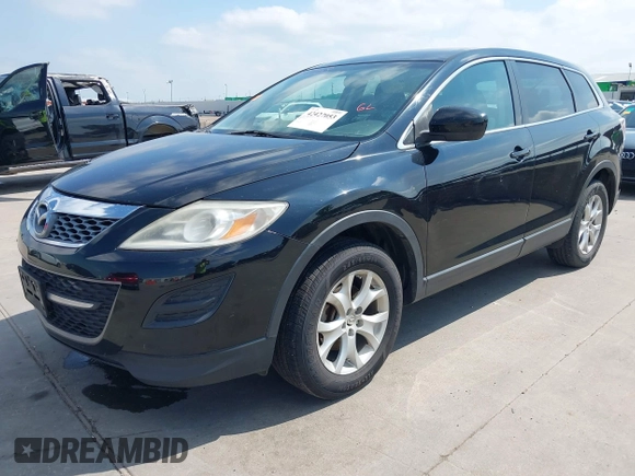 2011 Mazda CX-9 Sport with VIN JM3TB2BA7B0303120, listed as a IAAI auction lot 42427053 with 219,673 mi miles and . Bid and sale history available at DreamBid. Image 2.