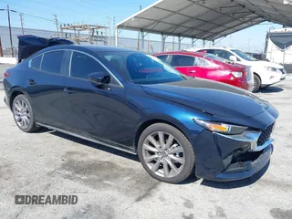 2025 Mazda 3 S Preferred z VIN JM1BPACM4S1779375, wystawiony jako IAAI lot #42205506 z przebiegiem 1 831 mil mil oraz . Historia ofert i sprzedaży dostępna na DreamBid. Obrazek 1.