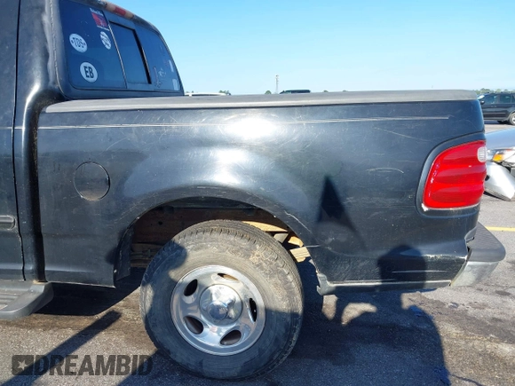 2001 Ford F-150 XLT z VIN 1FTRW07L61KC53030, wystawiony jako IAAI lot #42526499 z przebiegiem 121 675 mil mil oraz . Historia ofert i sprzedaży dostępna na DreamBid. Obrazek 16.