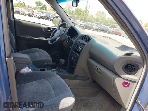 2002 Hyundai Santa Fe GLS with VIN KM8SC73D22U148410, listed as a IAAI auction lot 42159042 with 141,232 mi miles. Bid and sale history available at carsss.com. Image 5.
