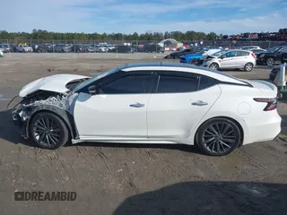 2020 Nissan Maxima Platinum with VIN 1N4AA6FV0LC385883, listed as a IAAI auction lot 41316172 with 80,490 mi miles and . Bid and sale history available at DreamBid. Image 14.
