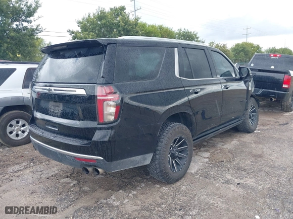 2021 Chevrolet Tahoe High Country with VIN 1GNSKTKL7MR330223, listed as a IAAI auction lot 40232561 with 66,743 mi miles. Bid and sale history available at carsss.com. Image 4.