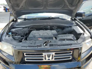 2006 Honda Ridgeline RTS z VIN 2HJYK16406H541241, wystawiony jako Copart lot #55735595 z przebiegiem 248 245 mil mil oraz Szkoda całkowita • Salvage title. Historia ofert i sprzedaży dostępna na DreamBid. Obrazek 11.