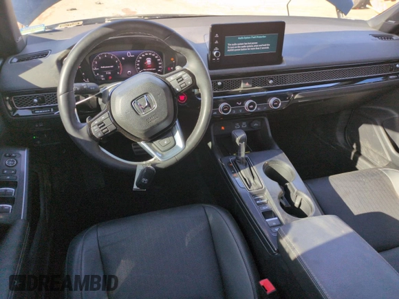 2023 Honda Civic Sport Touring z VIN 19XFL1H85PE402177, wystawiony jako Copart lot #52611605 z przebiegiem 56 306 mil mil oraz Szkoda całkowita • Salvage title. Historia ofert i sprzedaży dostępna na DreamBid. Obrazek 8.