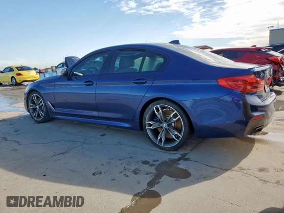 2020 BMW 5 Series M550i xDrive with VIN WBAJS7C09LCE06865, listed as a Copart auction lot 60140955 with Not provided miles and Salvage title. Bid and sale history available at DreamBid. Image 2.