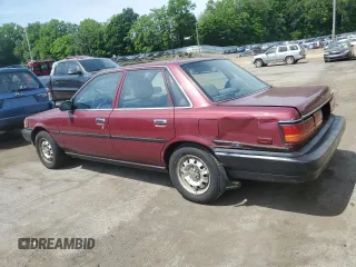 1991 Toyota Camry z VIN 4T1SV24E2MU387012, wystawiony jako Copart lot #57576164 z przebiegiem 117 436 mil mil oraz Nie do naprawy • Non repairable. Historia ofert i sprzedaży dostępna na DreamBid. Obrazek 2.