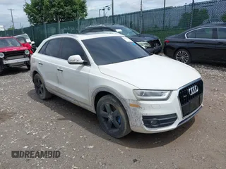2015 Audi Q3 Premium Plus z VIN WA1EFCFS8FR001278, wystawiony jako IAAI lot #42475043 z przebiegiem 125 417 mil mil oraz . Historia ofert i sprzedaży dostępna na DreamBid. Obrazek 1.
