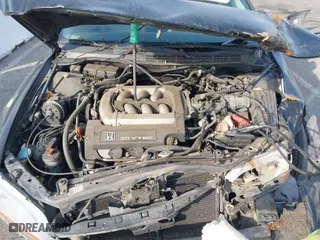 2002 Honda Accord Sdn EX w/Leather with VIN 1HGCG165X2A077913, listed as a IAAI auction lot 41470354 with 252,323 mi miles. Bid and sale history available at carsss.com. Image 10.