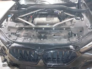 2021 BMW X6 xDrive40i with VIN 5UXCY6C03M9E61703, listed as a IAAI auction lot 41602401 with 1 mi miles. Bid and sale history available at carsss.com. Image 10.