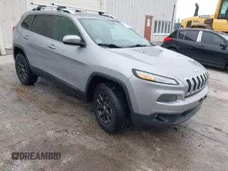 2014 Jeep Cherokee Latitude with VIN 1C4PJMCS1EW150140, listed as a IAAI auction lot 41907408 with 167,456 mi miles. Bid and sale history available at carsss.com. Image 1.