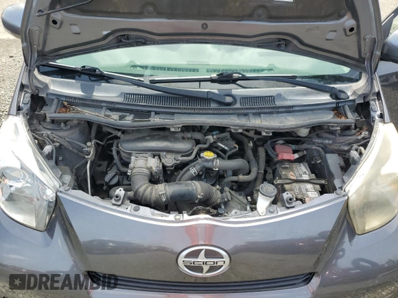 2012 Scion iQ z VIN JTNJJXB05CJ012193, wystawiony jako Copart lot #52180495 z przebiegiem Nie podano mil oraz Szkoda całkowita • Salvage title. Historia ofert i sprzedaży dostępna na DreamBid. Obrazek 11.