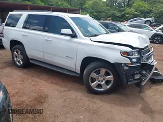 2016 Chevrolet Tahoe LT with VIN 1GNSCBKC9GR459057, listed as a IAAI auction lot 42541097 with 82,203 mi miles and . Bid and sale history available at DreamBid. Image 1.