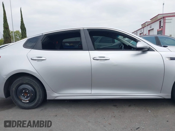 2016 Kia Optima LX with VIN 5XXGT4L34GG023812, listed as a IAAI auction lot 42034160 with 96,720 mi miles and . Bid and sale history available at DreamBid. Image 13.