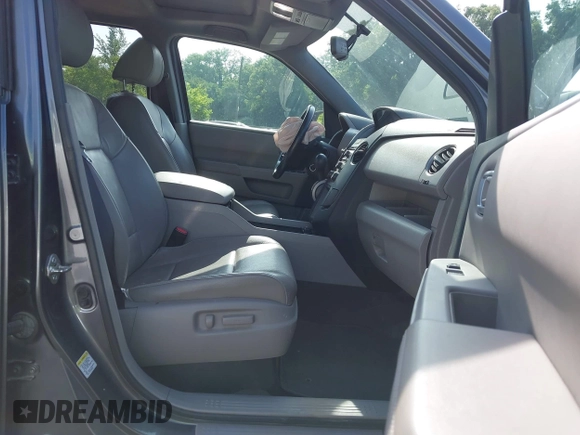 2013 Honda Pilot EX-L with VIN 5FNYF3H59DB038966, listed as a IAAI auction lot 42461394 with 142,684 mi miles and . Bid and sale history available at DreamBid. Image 5.