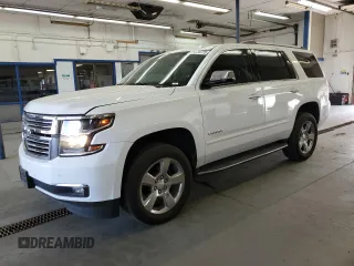 2017 Chevrolet Tahoe Premier with VIN 1GNSKCKC8HR389402, listed as a Copart auction lot 60274775 with 83,199 mi miles and Salvage title. Bid and sale history available at DreamBid. Image 1.