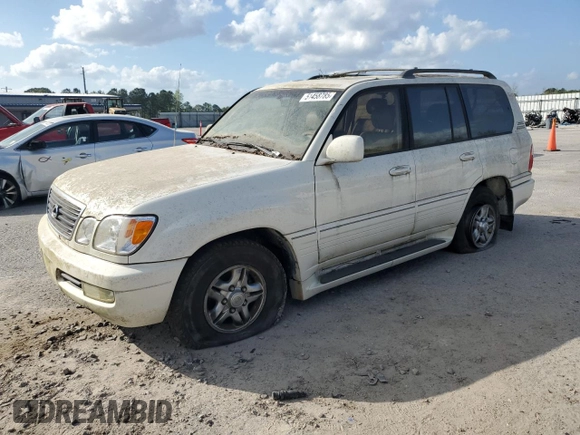 2002 Lexus LX 470 z VIN JTJHT00W623517039, wystawiony jako Copart lot #51458785 z przebiegiem 219 906 mil mil oraz Tytuł czysty. Historia ofert i sprzedaży dostępna na DreamBid. Obrazek 1.