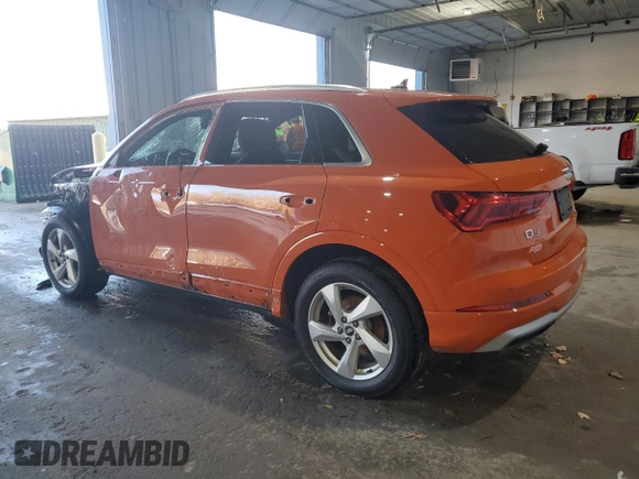 2021 Audi Q3 Premium with VIN WA1AUCF38M1134874, listed as a Copart auction lot 84907564 with 49,873 mi miles and Salvage Title. Bid and sale history available at DreamBid. Image 2.