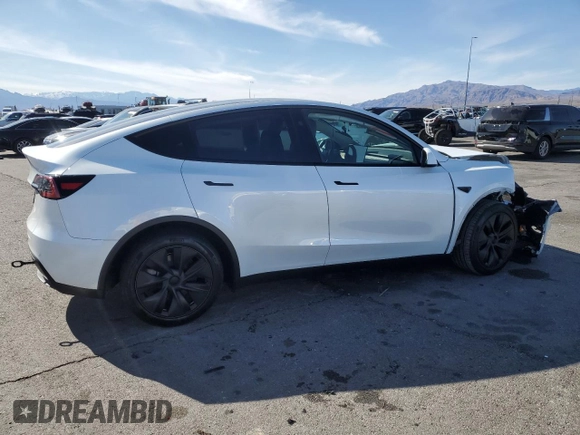 2025 Tesla Model Y Long Range with VIN 7SAYGDED2SA373756, listed as a Copart auction lot 49866835 with 3,318 mi miles and Salvage Title. Bid and sale history available at DreamBid. Image 3.