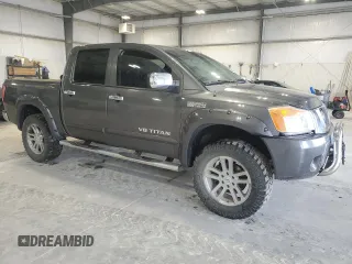 2012 Nissan Titan SL with VIN 1N6BA0ECXCN300562, listed as a Copart auction lot 58244125 with 131,595 mi miles and Salvage title. Bid and sale history available at DreamBid. Image 4.
