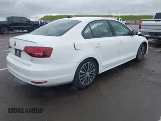 2016 Volkswagen Jetta Sedan 1.8T Sport with VIN 3VWD17AJ3GM404199, listed as a IAAI auction lot 41934993 with 43,183 mi miles. Bid and sale history available at carsss.com. Image 4.
