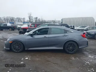 2020 Honda Civic Si with VIN 2HGFC1E55LH707320, listed as a IAAI auction lot 41569008 with 65,441 mi miles and . Bid and sale history available at DreamBid. Image 14.