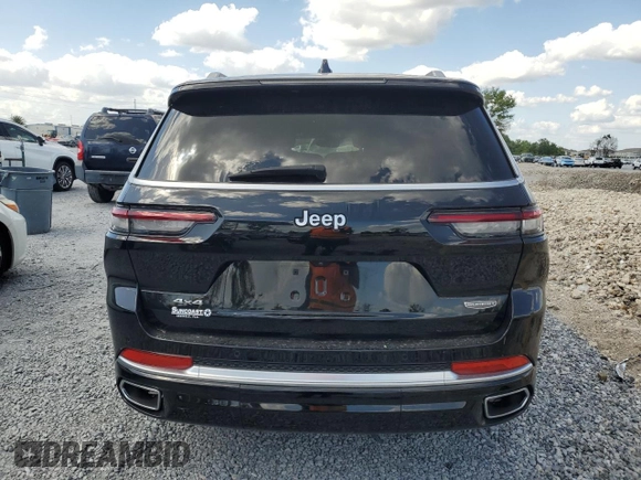 2023 Jeep Grand Cherokee Summit Reserve with VIN 1C4RJKEG5P8853916, listed as a Copart auction lot 52691735 with 18,899 mi miles and Salvage title. Bid and sale history available at DreamBid. Image 6.