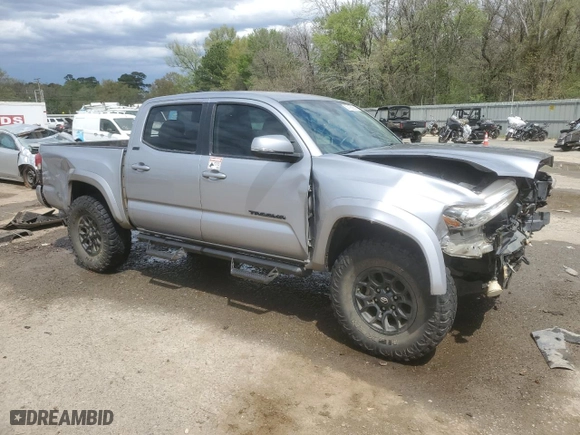 2020 Toyota Tacoma 4WD SR5 with VIN 3TMCZ5AN6LM310312, listed as a Copart auction lot 50162955 with 82,710 mi miles and Salvage Title. Bid and sale history available at carsss.com. Image 4.