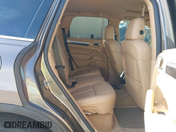 2011 Porsche Cayenne S Hybrid with VIN WP1AE2A29BLA94414, listed as a IAAI auction lot 41644386 with 76,095 mi miles. Bid and sale history available at carsss.com. Image 8.