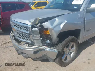 2015 Chevrolet Silverado 1500 LT with VIN 3GCUKREC7FG343346, listed as a IAAI auction lot 41972214 with 256,067 mi miles and . Bid and sale history available at DreamBid. Image 6.