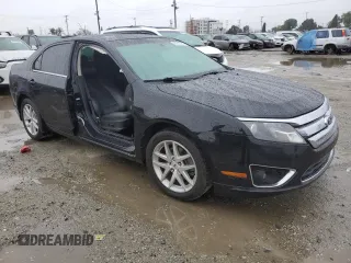 2012 Ford Fusion SEL z VIN 3FAHP0JAXCR156966, wystawiony jako Copart lot #47813775 z przebiegiem 117 963 mil mil oraz Szkody całkowita. Historia ofert i sprzedaży dostępna na DreamBid. Obrazek 4.