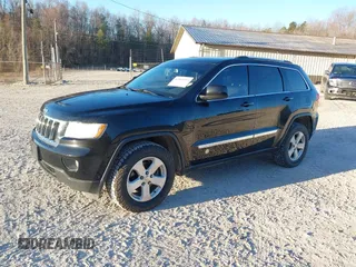 2012 Jeep Grand Cherokee Laredo with VIN 1C4RJFAG3CC246577, listed as a IAAI auction lot 41807693 with 164,574 mi miles. Bid and sale history available at carsss.com. Image 17.