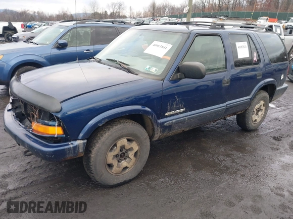 2004 Chevrolet Blazer LS z VIN 1GNDT13X54K156205, wystawiony jako IAAI lot #40983841 z przebiegiem 191 877 mil mil oraz . Historia ofert i sprzedaży dostępna na DreamBid. Obrazek 2.