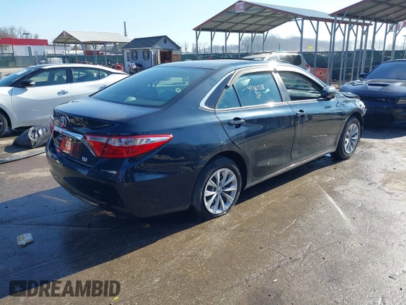 2015 Toyota Camry LE z VIN 4T1BD1FK8FU172673, wystawiony jako IAAI lot #41780228 z przebiegiem 171 308 mil mil oraz . Historia ofert i sprzedaży dostępna na DreamBid. Obrazek 4.